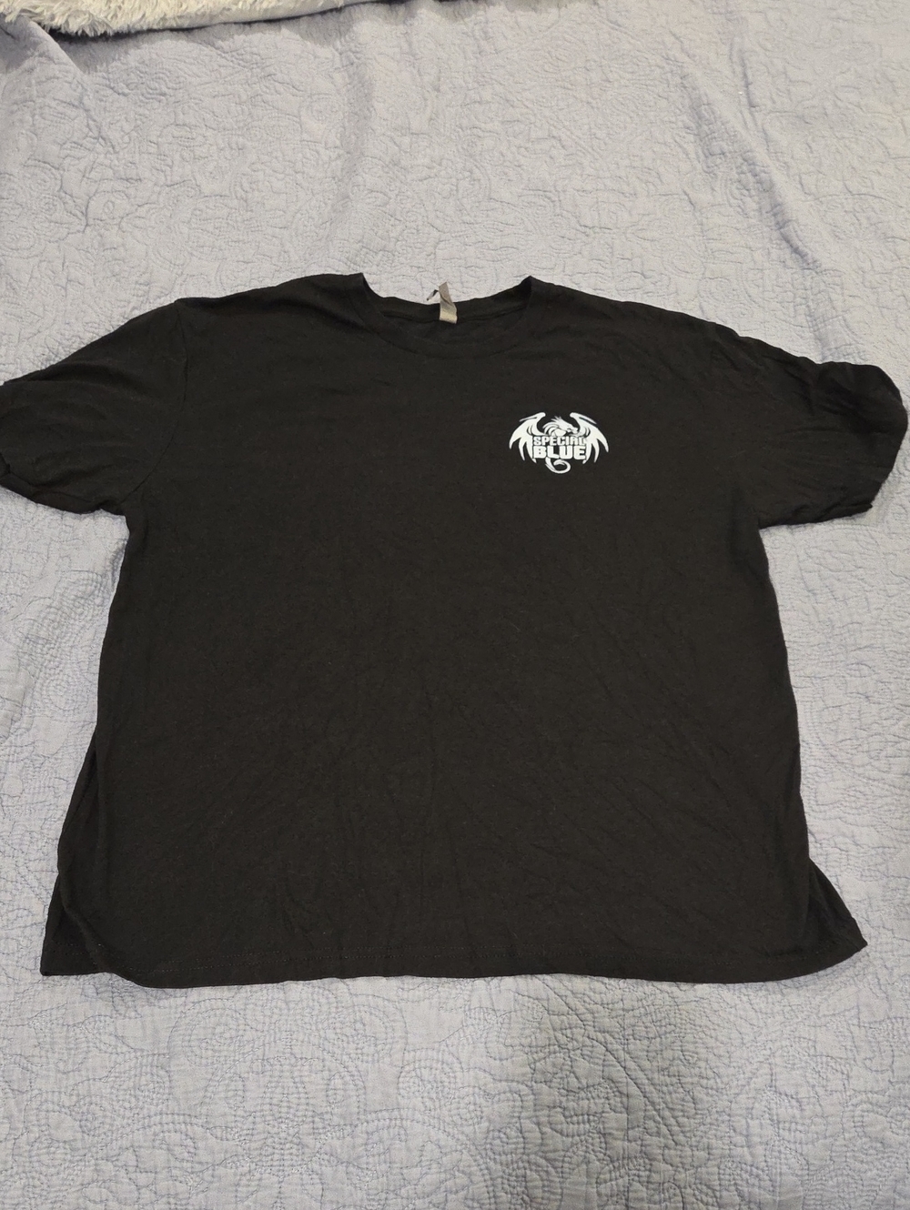 Next Level Apparel Black Short-Sleeve Tee with Small White Chest Graphic